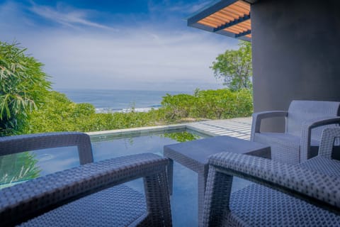 Relax on the covered terrace while enjoying tranquil views of the Pacific Ocean.