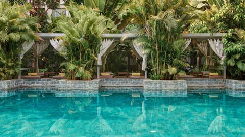 2 outdoor pools, open 8:00 AM to 9:00 PM, free cabanas, pool umbrellas