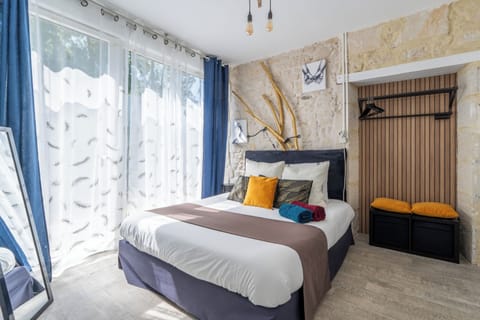 La Tribu | Individually decorated, individually furnished, blackout drapes