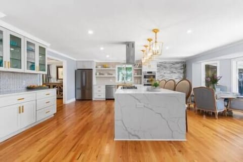 Opulent kitchen with waterfall island 