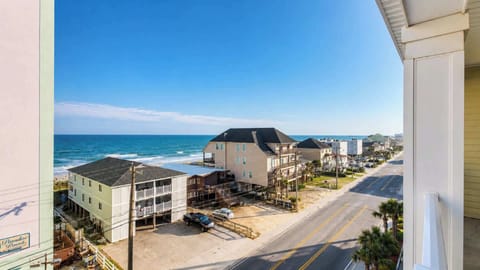 Look past the beach houses to the Atlantic, right from the balcony.