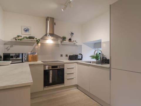 Fridge, electric kettle, toaster, cookware/dishes/utensils