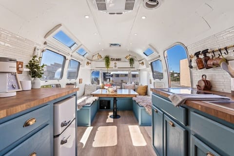 A spacious dining area in the front is perfect for gathering around for game night after a full day on the town. 