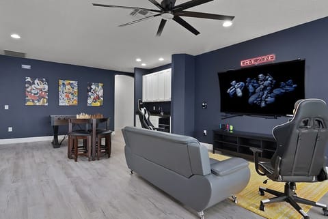 Game Room with WII Switch Gaming Area 70" 4K HDTV & Gaming Chairs