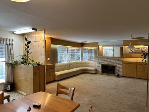 large front room with many built ins including the cough. 