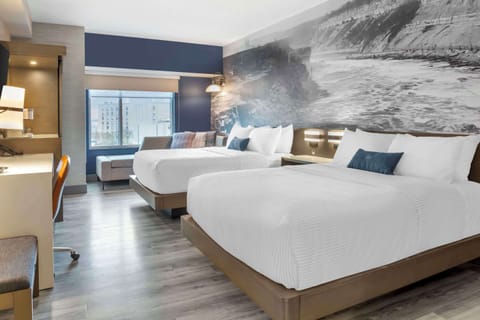 Premium bedding, pillowtop beds, desk, laptop workspace