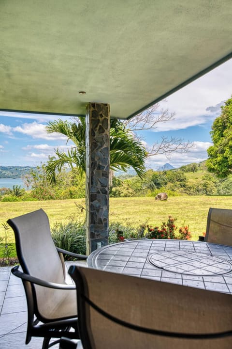 The patio with views of the lake and volcano while you relax day and or night.