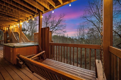 Private outdoor hot tub on the lower level deck