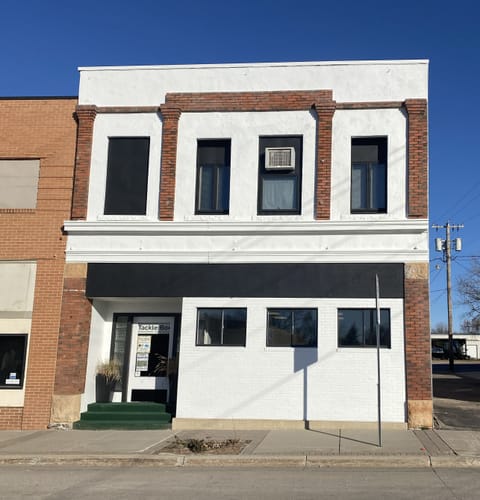 Tackle Box Loft is located on the second floor. Entrance from alley or main st.