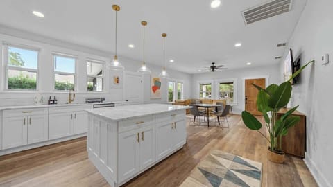 Experience ultimate luxury in our airy, sun-drenched kitchen. With marble countertops and a massive island, it’s a chef’s dream come true.