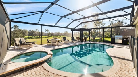 Extended pool deck with heated pool & spa and built-in bbq/grill 