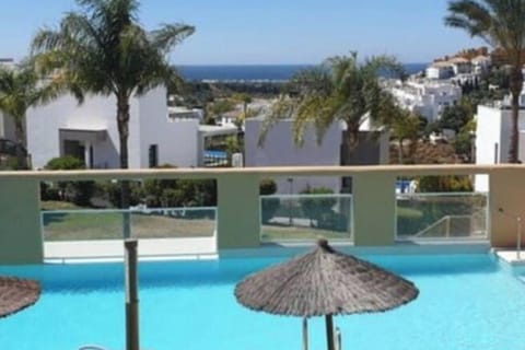 Swimming pool with stunning sea views.