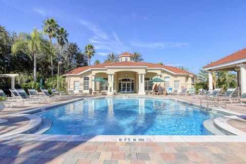 Enjoy Emerald Island Resort's pool and clubhouse, the perfect place to unwind after a day at the parks