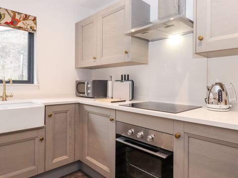 Fridge, electric kettle, toaster, cookware/dishes/utensils