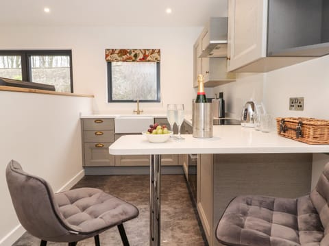 Fridge, electric kettle, toaster, cookware/dishes/utensils