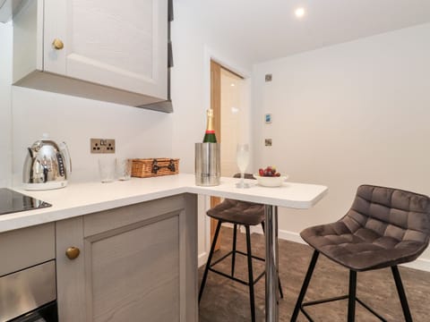 Fridge, electric kettle, toaster, cookware/dishes/utensils