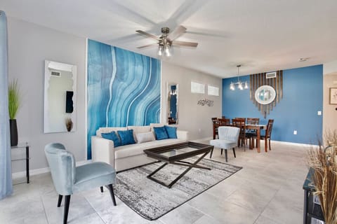 Modern Open Layout Concept blends Kitchen, Dining Room and Living Room#Disney #Parks #kingdom #springs #StoreyLake #resort #Apartment #Vacation #Rental #waterpark #Kissimmee #Orlando #universal #citywalk