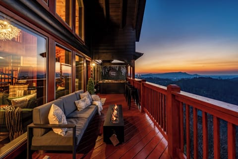 Step onto the deck and watch the Smokies layer themselves all the way to the horizon. You'll get the view that books rebookings.