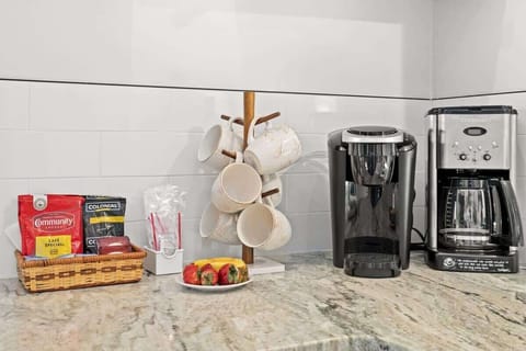 Kitchen with Keurig and drip coffee makers.