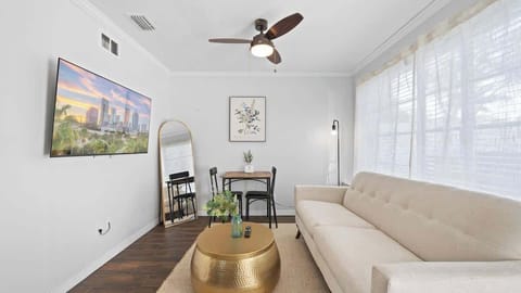 Chill out in style – cozy living room with your favorite shows on the big screen