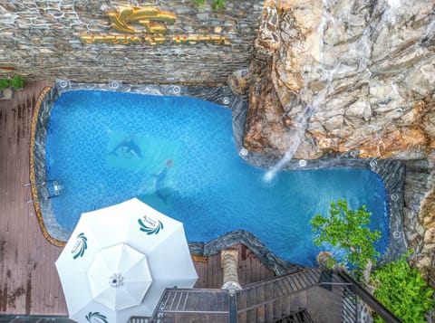 Outdoor pool, pool umbrellas, sun loungers