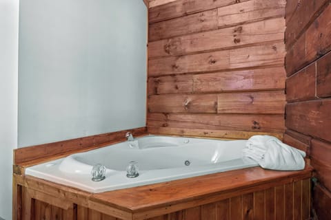 Luxury in the woods! Soak in your own in-room Jacuzzi after a day of mountain exploring.
