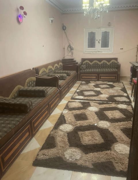 Comfort Apartment | Living area | 32-inch flat-screen TV with satellite channels, fireplace