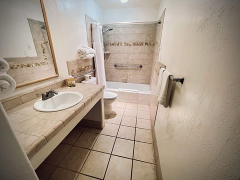 Basic Room, 2 Queen Beds | Bathroom | Soap, shampoo, toilet paper