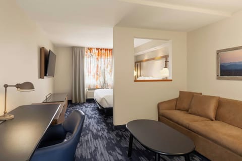 Pillowtop beds, desk, blackout drapes, iron/ironing board