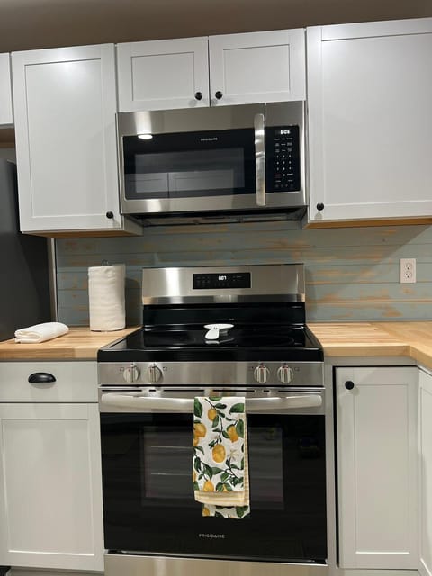 Kitchen is fully equipped with full size appliances
