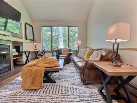 Perfect spot to unwind with a fireplace and TV