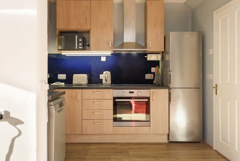 City House | Private kitchen | Full-size fridge, microwave, oven, stovetop