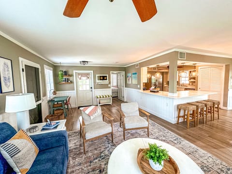 Open concept living, dining, and kitchen areas