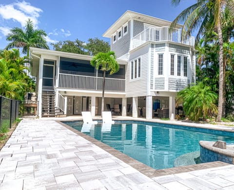 Lounge by the heated pool in comfort and take in the best views of the ocean.