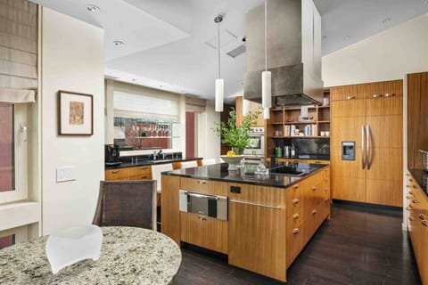 The kitchen is spacious and efficient. Perfect place to prepare a family meal.