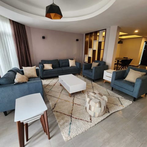 Family Apartment | Living area | 24-inch Smart TV with satellite channels