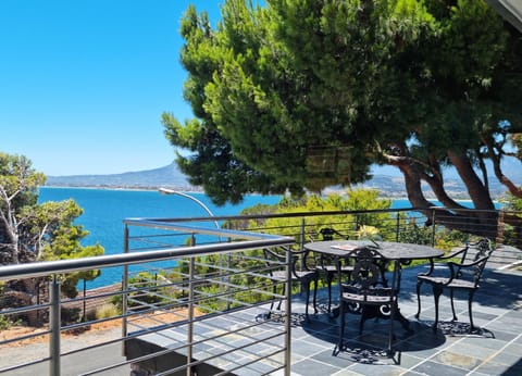 The outside seating area on the balcony.