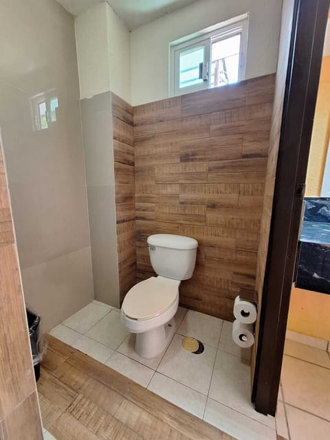 Basic Triple Room | Bathroom | Shower, rainfall showerhead, towels, toilet paper