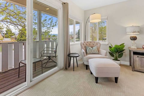 The master suite has sliding doors to the private balcony.