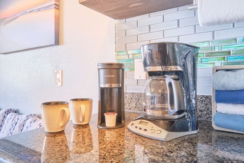 Coffee maker and Keurig single cup are provided for a delightful fresh brew in the morning.