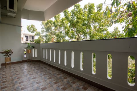 Family Room, 2 Double Beds, City View | Balcony