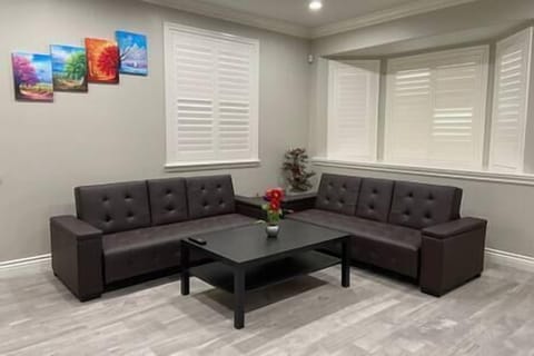 Spacious living room with two sofas.