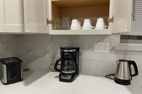 Brand New toaster, coffee maker, & water boiler along with cups