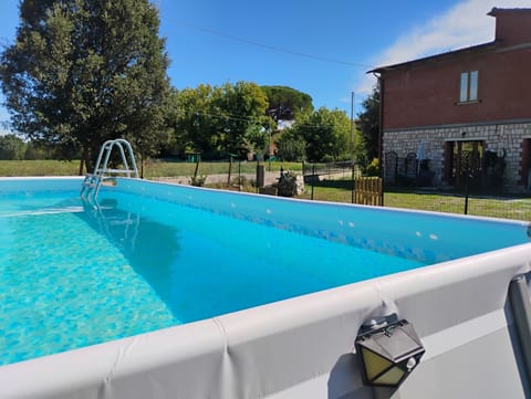 PISCINA CON GIARDINO E VISTA PANORAMICA