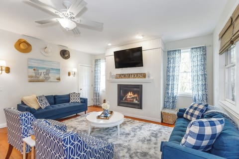 Cozy living room with fireplace and smart TV