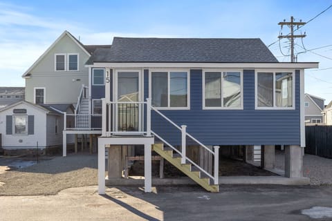 The cottage is the unit in front of the building and right up these stairs.