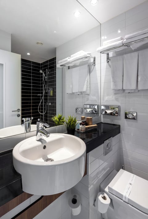 Shower, free toiletries, hair dryer, slippers