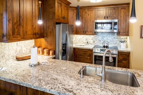 Condo, 2 Bedrooms | Private kitchen | Fridge, oven, coffee/tea maker, toaster