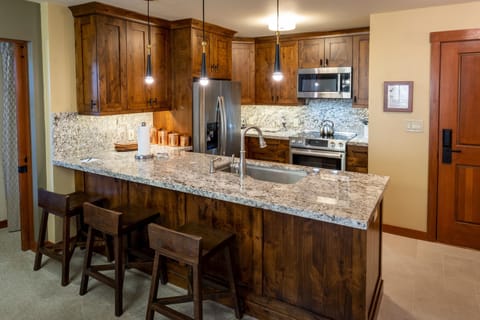 Condo, 2 Bedrooms | Private kitchen | Fridge, oven, coffee/tea maker, toaster