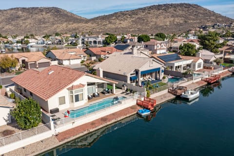 Extra long swimming pool with spa.  Paddle around the lake and catch some fish! 